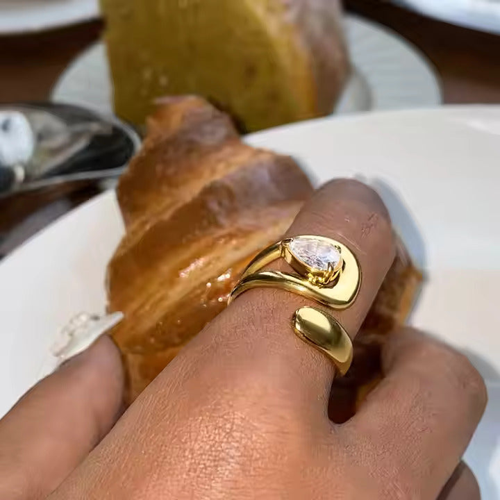 stylish gold ring with teardrop crystal stone modern design for office wear women
