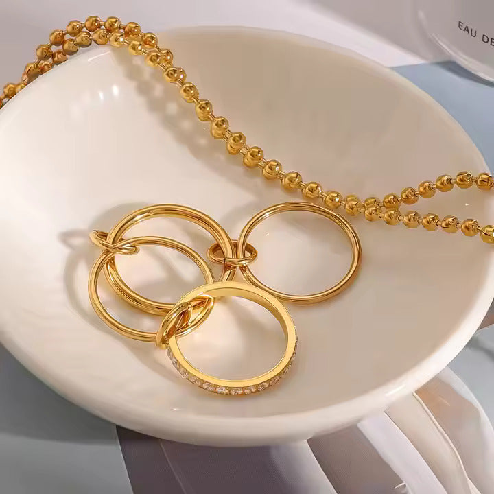 Trending gold rings for women with stacked band and crystal detailing