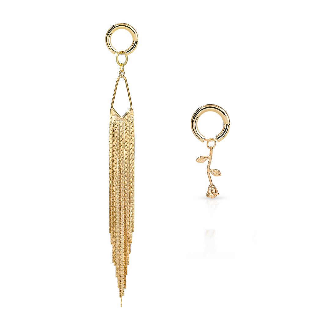 Gold tassel earrings for women and floral ear cuff on a white background