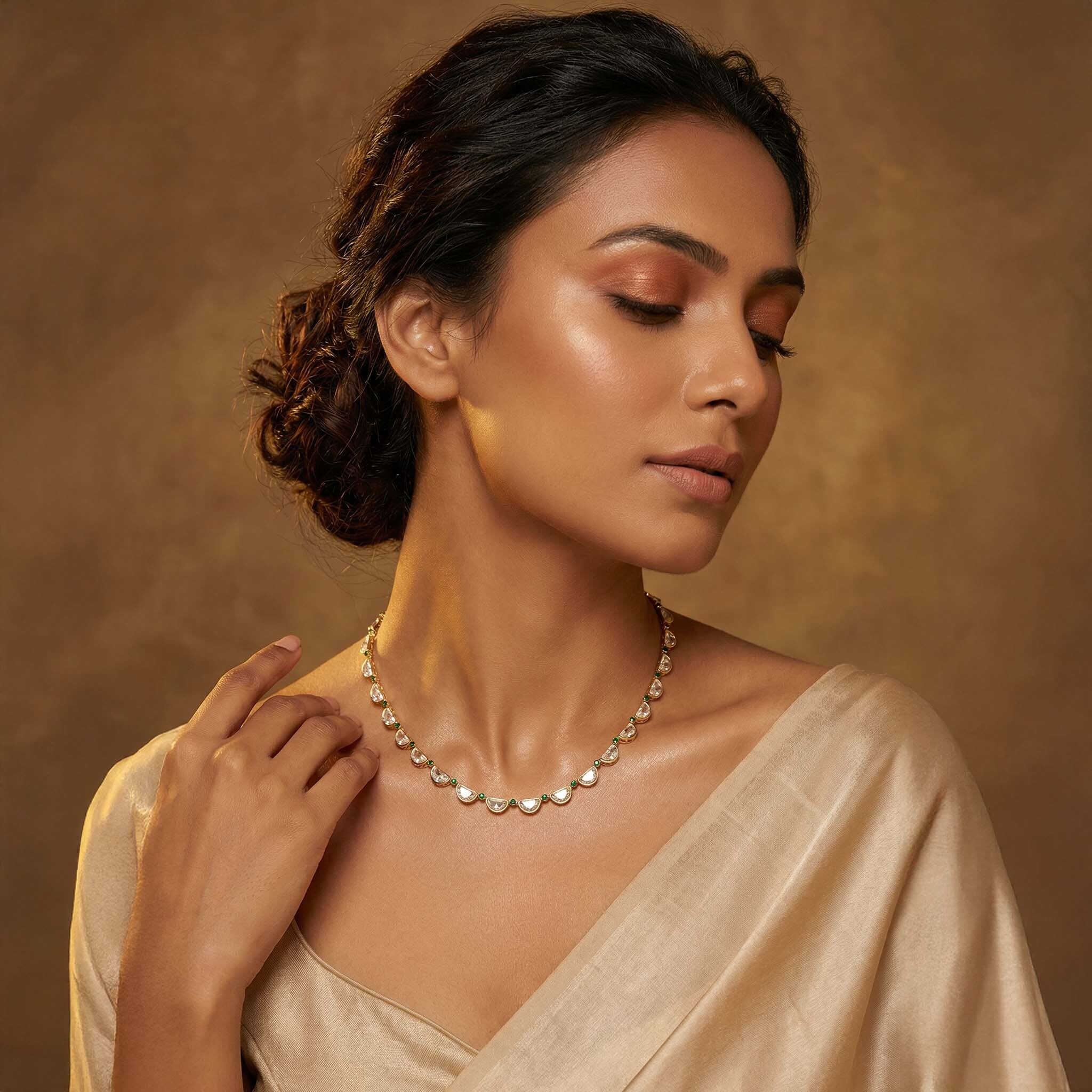 Gold necklace for women styled with ethnic outfit, trendy party wear necklace