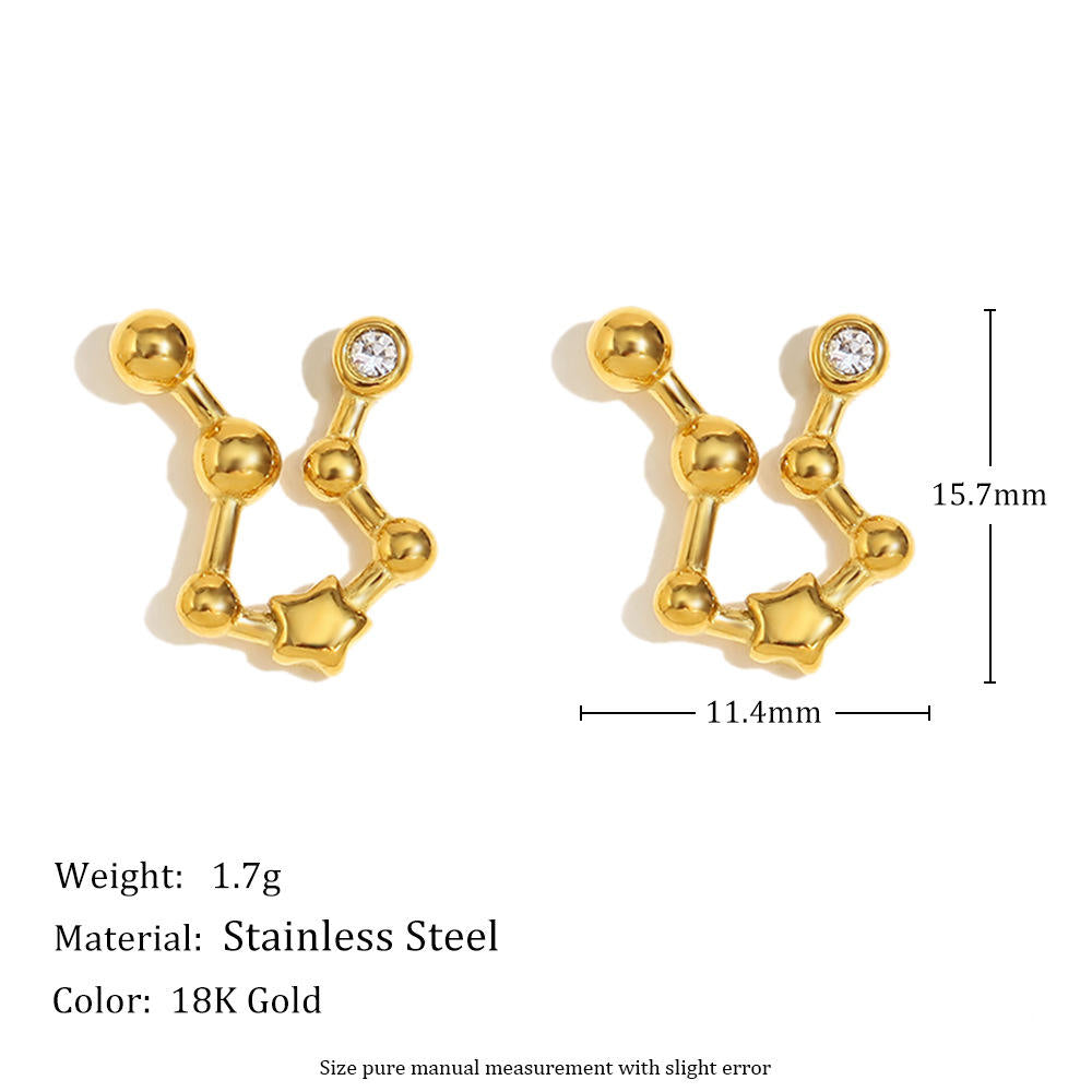 Gold earrings with measurements and material details on a white background