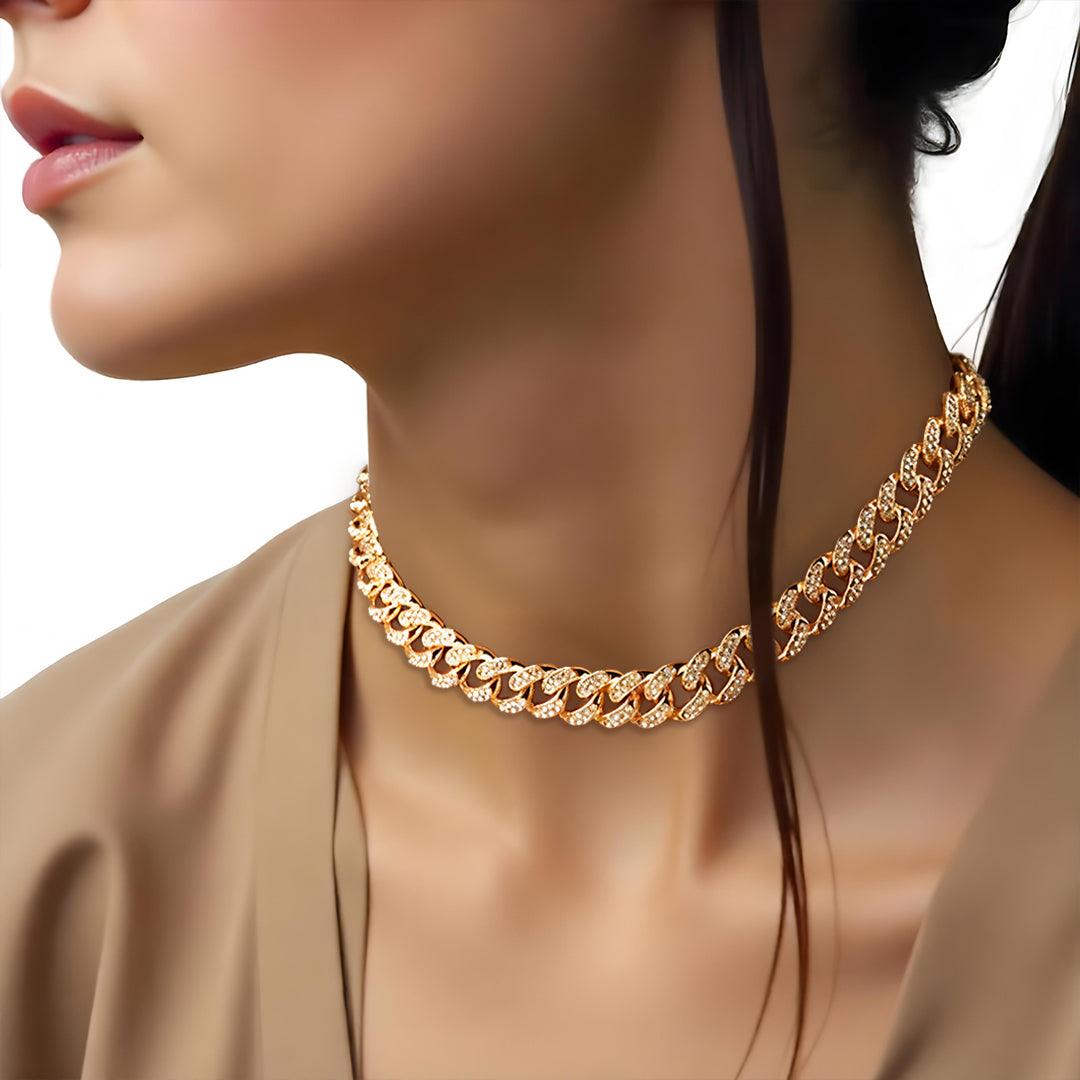 Gold chain necklace for women worn by a model on a white background