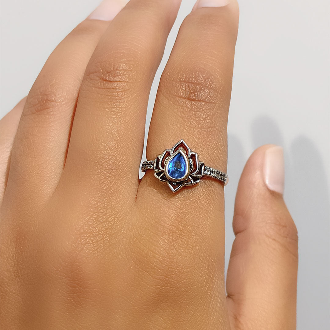 Silver ring with a blue gemstone