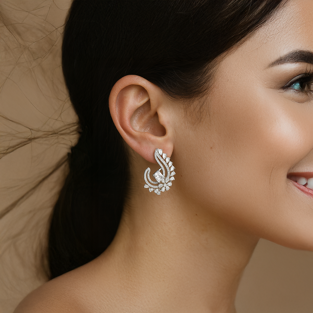 Close-up of a woman wearing a Silver earring for women with a neutral background