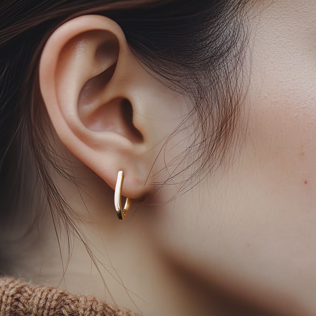 Sleek Twist Huggie Earring